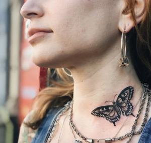 beautiful Neck butterfly female tattoo