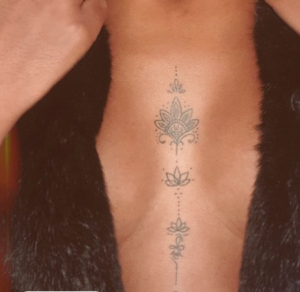 black girl breast tattoo design