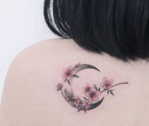 half moon tattoo with flowers