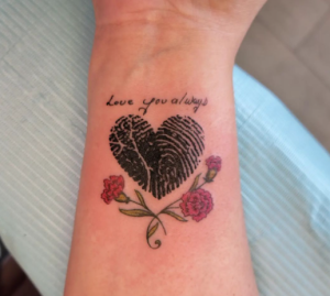 heart shaped finger print tattoo for girl