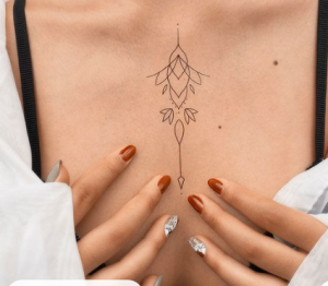 ornamental tattoo on female breast