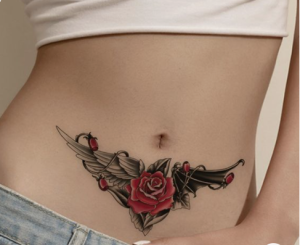 red rose in center of belly tattoo