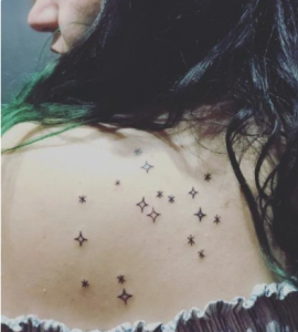 star on back of woman