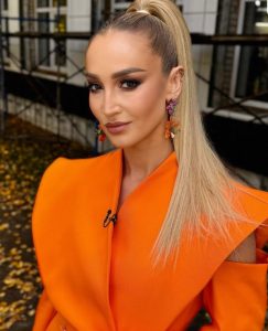 Olya Buzova’s Beachside Glamour and Playful Posts Win Fans’ Attention