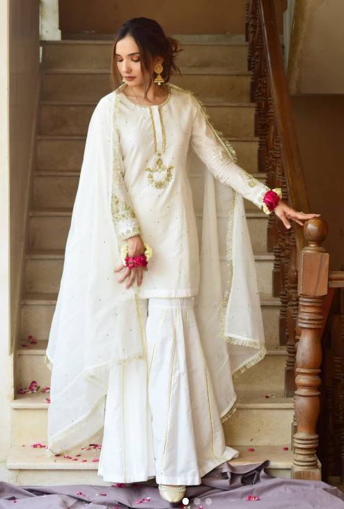 a Beautiful girl in white garara dress