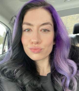 Natasha aughey in Purple hair selfi